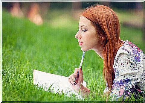 woman writing in her diary