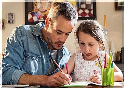 father painting with his daughter