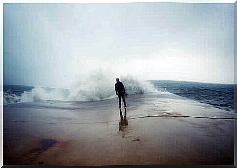 man facing rough sea