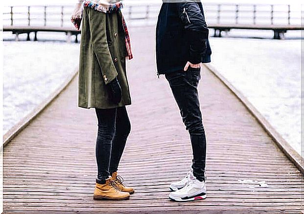 couple talking on the pier