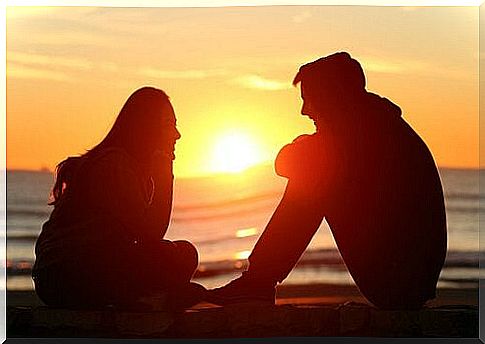 couple talking at sunset