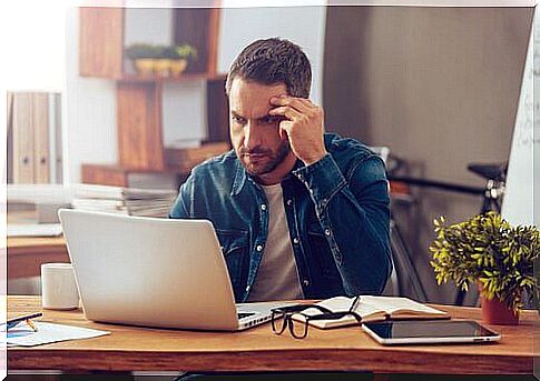 man stressed at work