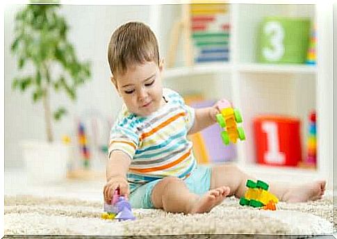 baby playing on the floor