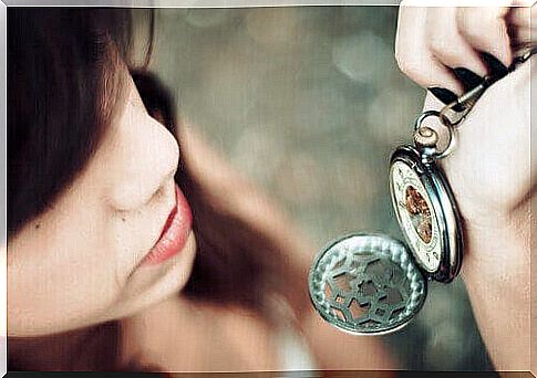 woman looking at clock