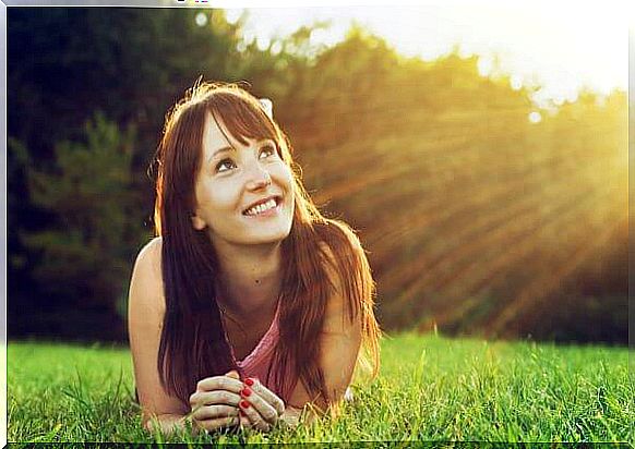 young man smiling outdoors