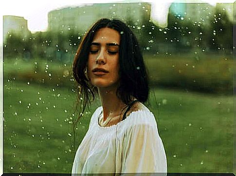 woman enjoying the rain