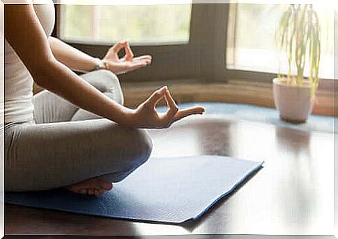 woman meditating at home